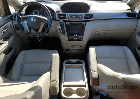 2016 Honda Odyssey Touring z USA, uszkodzony, nr VIN 5FNRL5H94GB088853